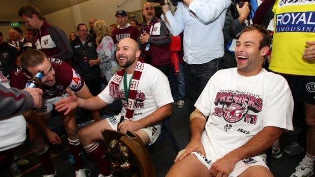 Grand night: Glenn and Brett Stewart after winning the 2011 grand final against the Warriors.