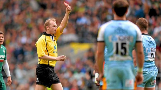 Referee Wayne Barnes shows the red card to Dylan Hartley.