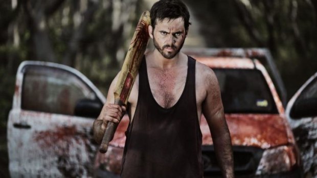 Swinging: Barry (Jay Gallagher) in <i>Wyrmwood: Road of the Dead</i>.