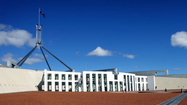 Full mast ... The flag on Parliament House was not lowered for Nelson Mandela's death. <em> File photo: Jessica Shapiro </em>