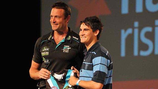 Port Adelaide coach Matthew Primus with Power's first pick, and 6th overall, Chad Wingard.