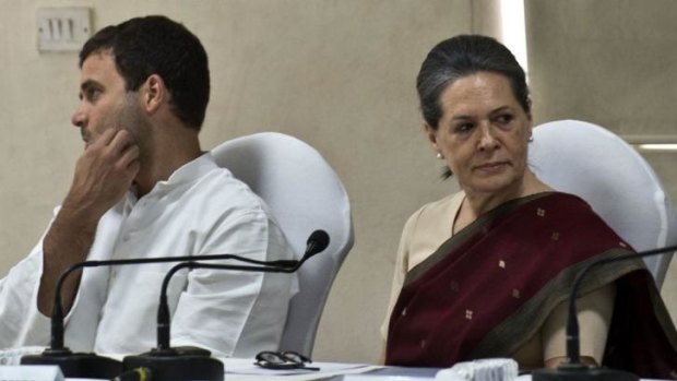 Offered to go: Congress party president Sonia Gandhi (right) and vice-president Rahul Gandhi at the Monday meeting to discuss Congress' future, where their resignations were rejected.