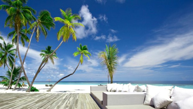 Palm of paradise ... the beach meets a terrace at Alila Villas.