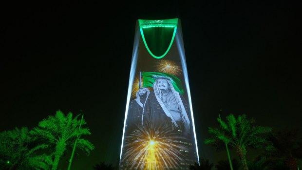 The images of King Salman and Crown Prince Mohammed bin Salman are projected on the Kingdom Tower during National Day ceremonies in Riyadh, Saudi Arabia. 
