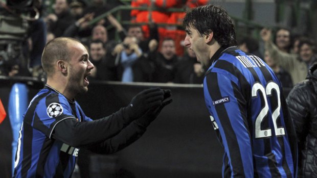 Inter Milan's Diego Milito (right) celebrates with his team mate Wesley Sneijder after scoring against Chelsea during their Champions League match at the San Siro stadium in Milan.