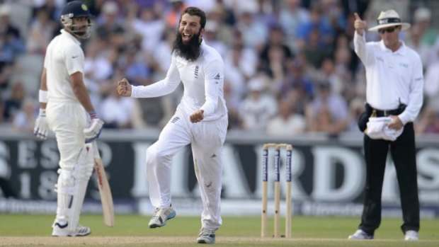 Moeen Ali celebrates the dismissal of Cheteshwar Pujara as England ease towards an innings victory in the fourth Test.