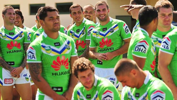 Another chance: Blake Ferguson (centre) was all smiles during Canberra's photo shoot yesterday as Josh Dugan's exit was announced.