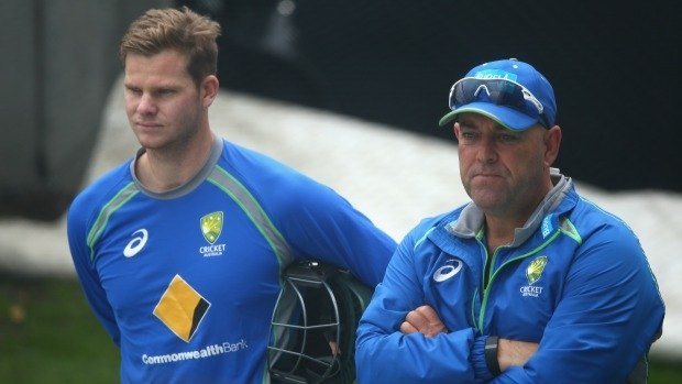 Under the pump: Steve Smith and Darren Lehmann watching the rain at Blundstone Arena.
