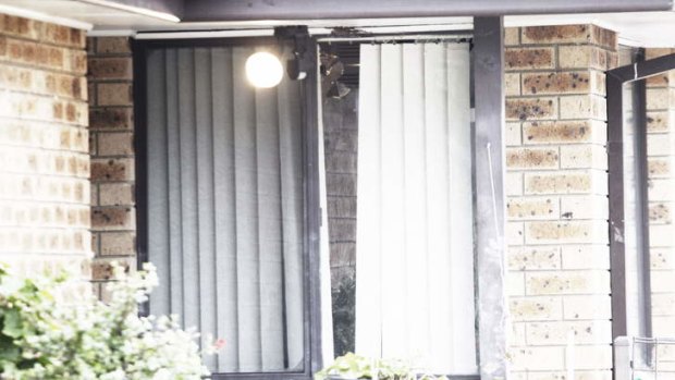 Gunshot damage to a window at the house in Sunnyholt Road, Blacktown.