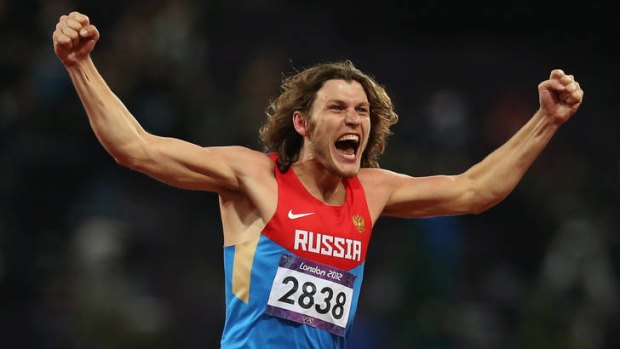 Gold ... Ivan Ukhov of Russia celebrates.