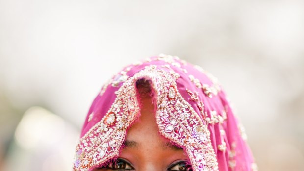 An elegantly decorated and dressed Indian bride.