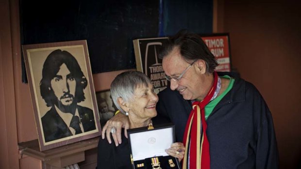 June Stewart and son Paul with a portrait of Tony.
