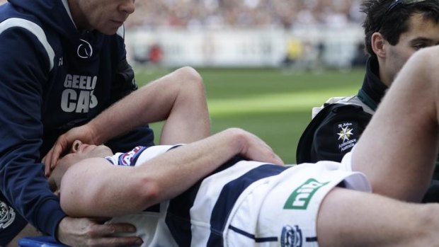 Good chance ... Star Cats forward Steve Johnson is stretchered off the ground after dislocating his patella against West Coast.