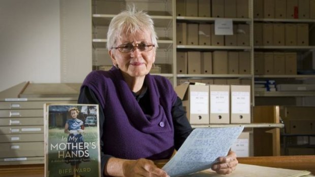 Author Biff Ward with her book <i>In My Mother's Hands</i>.