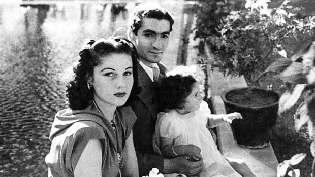 Shah Muhammed Riza Pahlevi, his wife, Queen Fawzia and Princess Shahnaz on the grounds of their palace near Tehran, Iran.