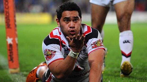 Sealed with a kiss ... try-scoring machine Konrad Hurrell scored a treble against the Titans on Saturday night.
