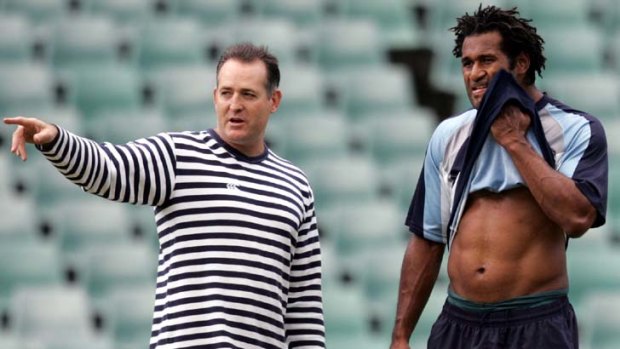 Sage ... Lote Tuqiri gets some instructions from David Campese during a Waratahs training session in 2005.