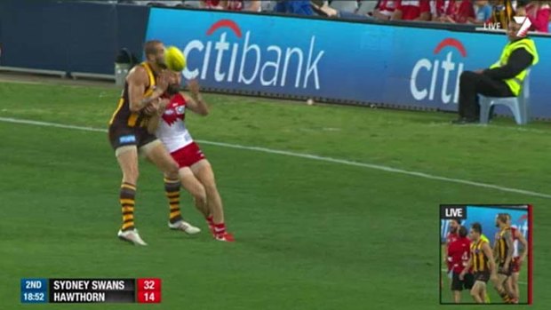 Head games: Lance Franklin has been reported for a bump on Nick Malceski during Friday night's game between Hawthorn and the Swans at ANZ Stadium.