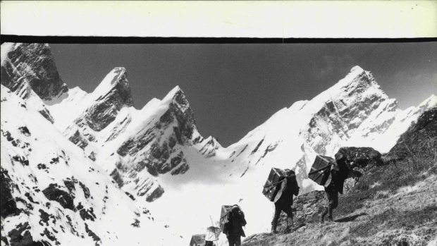 The expedition reaches Changabang, 6,700 metres up on the high road to Dunagiri. The snow peak at right is Kalanka. May 18, 1978.