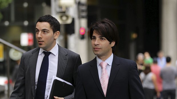 Fadi Ibrahim (right), with his lawyer Nicholas Hana, arrive at court for the opening of the trial.