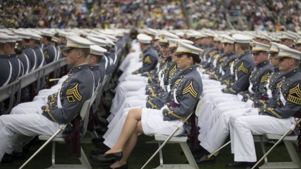 Future tense: members of the 2014 West Point graduating class listen to Mr Obama's speech.