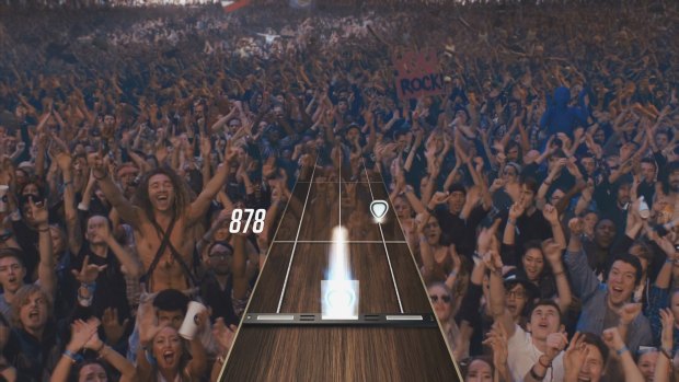 <i>Guitar Hero Live</i> is played from a new first-person view, and features real footage of a crowd and bandmates who react positively when you're doing well ...