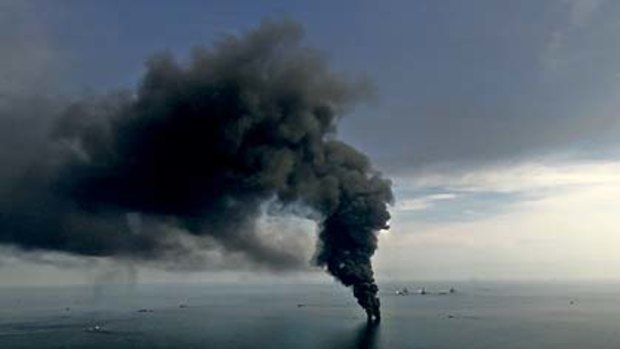 Smoke billows from controlled oil burns near the site of the BP Plc Deepwater Horizon oil spill.