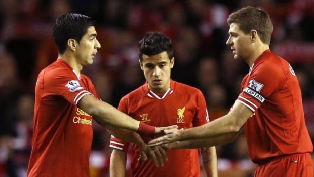 Strike power: Liverpool's Luis Suarez, Philippe Coutinho and Steven Gerrard.