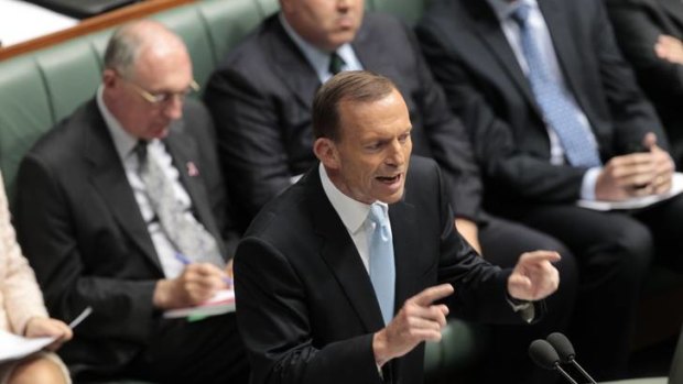 Opposition Leader Tony Abbott moves a motion to dismiss the Speaker Peter Slipper during question time.