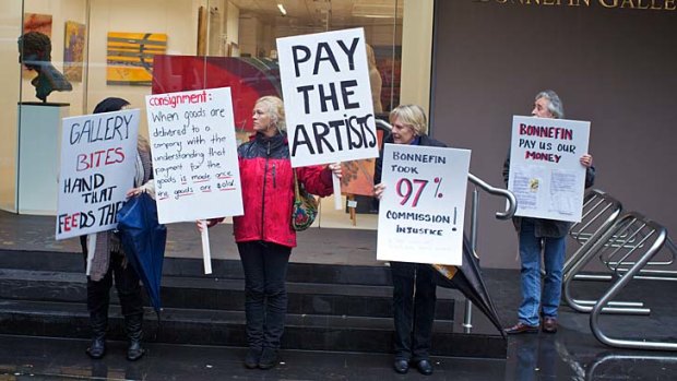 Artists protest outside Bonnefin gallery, which they claim owes them money from sold artworks.