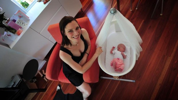 Former model Anneliese Suebert with her first child, daughter Camille, 11 days old.