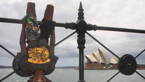 Perfect position ... Delwyn "D.J." Gothachalkenin, 9, from the far north Queensland Aboriginal community of Arukun, was rewarded with a trip to Sydney for New Year’s Eve for good school attendance last year.