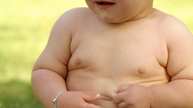 Modelled eating habits ... kids of obese fathers are far more likely to be fat themselves.