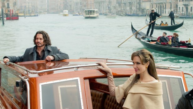 Johnny Depp and Angelina Jolie in sluggish thriller <i>The Tourist</i>.