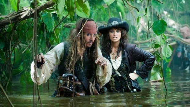Johnny Depp and Penelope Cruz in <i>Pirates of the Caribbean: On Stranger Tides</i>. The film cost $US250 million to make and has grossed more than $1 billion worldwide.