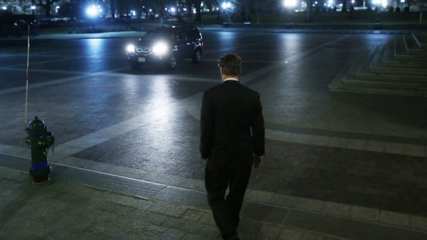 Senator Rand Paul walks to a waiting vehicle as he leaves the Capitol after his filibuster.