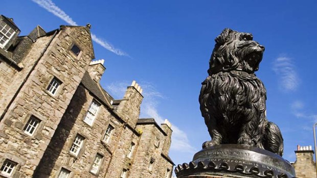 Greyfriars Bobby is commemorated by a statue in Edinburgh, but the legendary tale of the loyal dog was just a tourist scam, a historian claims.
