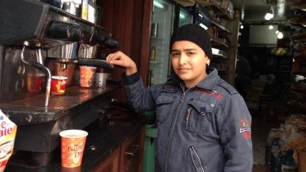 Syrian refugee Mohamed makes coffee in a Lebanese cafe to support his family of seven.