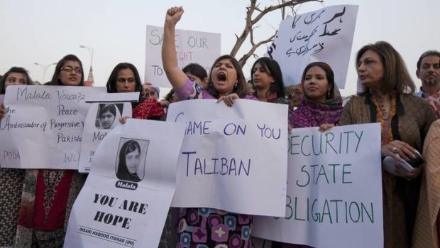 Action &#8230; activists hold placards and pictures of Malala Yousafzai during a demonstration in Islamabad.