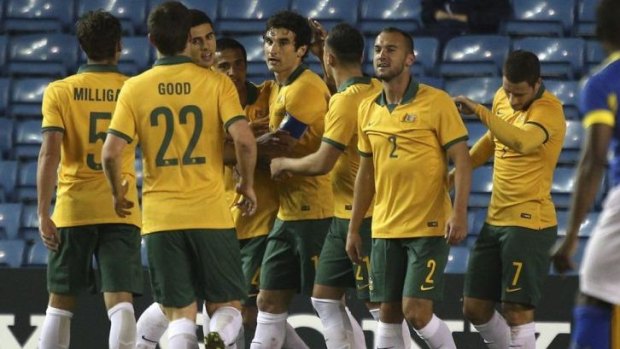 Generation next: The Socceroos, likely to be led by Mile Jedinak (centre) in Brazil, will be virtually unrecognisable to previous World Cup squads.