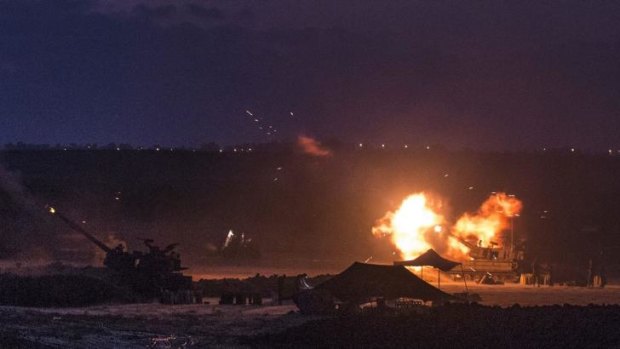 Israeli attack: An artillery gun fires a 155-millimetre shell towards targets in the Gaza Strip on Wednesday.