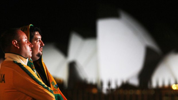 Sydney's Sydney Opera house is lit up like a ball as fans anxiously await the announcement.