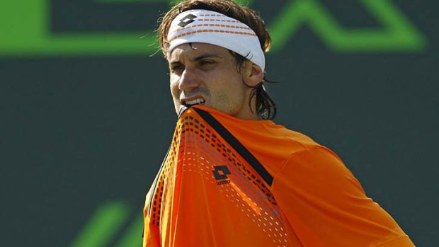 Frustrated . . . David Ferrer of Spain.