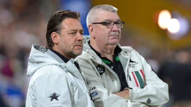 Happy Bunnies: Souths owner Russell Crowe and CEO Shane Richardson watch from the sidelines during their side's ultimately convincing win over the Broncos.