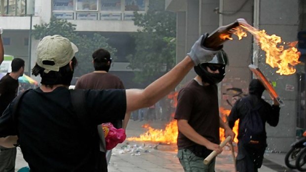 Incendiary ... Greek protesters take to the streets to fight proposed austerity measures.