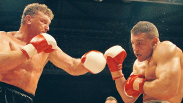 Joe Bugner (left) and Vince Cervi box at the Carrara Entertainment Centre on Australia's Gold Coast.