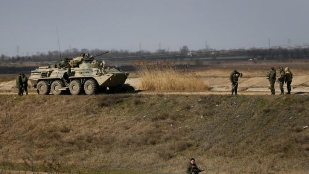 A Russian APC and soldiers near the Crimean town of Djankoy.