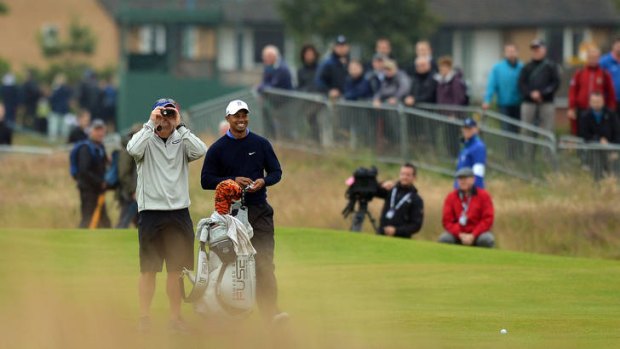On the prowl ... Tiger Woods looked relaxed on Tuesday during a practice round at Royal Lytham and St Annes, venue for the British Open, which tees off on Thursday.