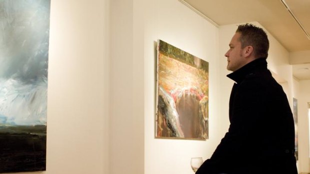 Painter Adam Cusack at the Axia Modern Art gallery, which has gone into liquidation.