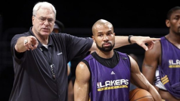 Phil Jackson and Derek Fisher during their time together at the LA Lakers in 2010.